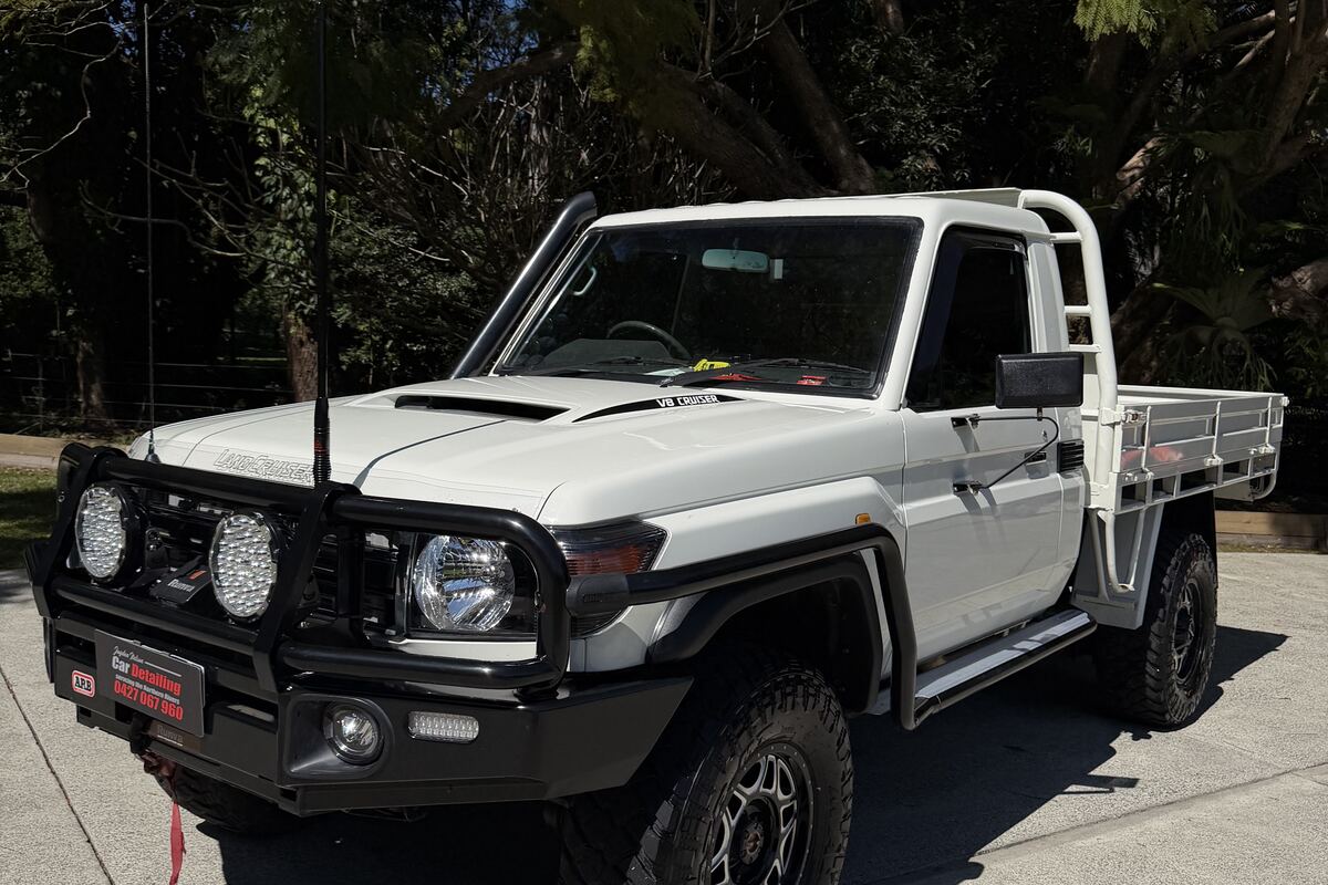 A white single-cab LandCruiser work ute finished by Jayden Nelson